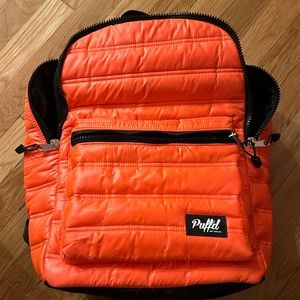 Orange Puffed Backpack.
